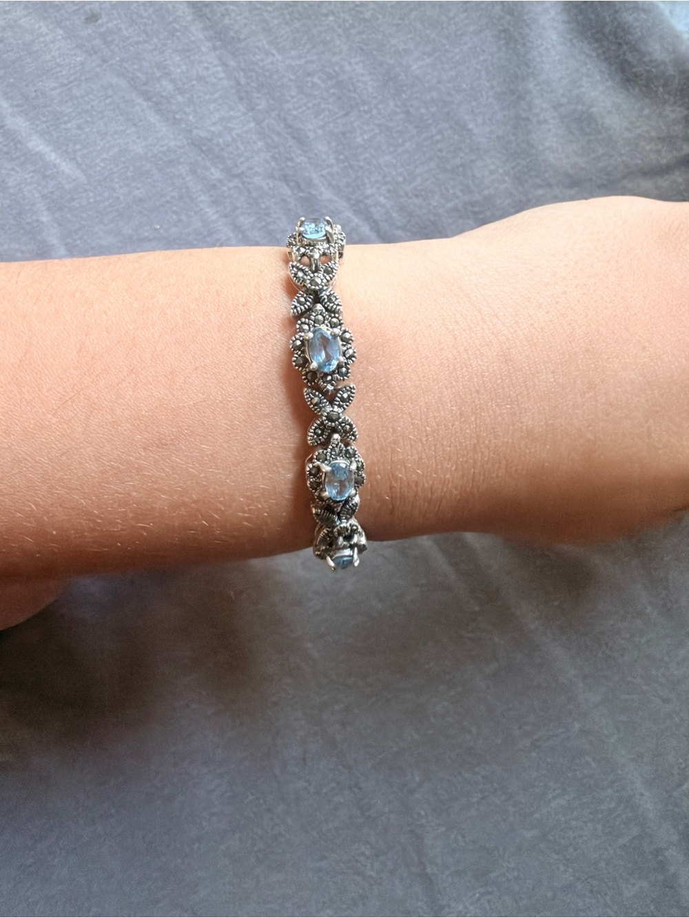 Vintage sterling silver marcasite and blue topaz XO tennis bracelet